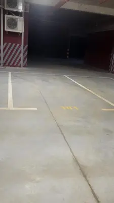 an empty parking lot in an airplane garage at BrandNew Apartment in Podgorica