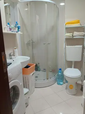 a bathroom with a shower and a toilet and a sink at Vila Teodora in Budva