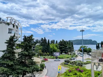 a street in a town with a view of the water at Apartment Bjanka in Budva