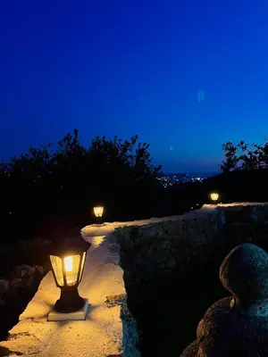 a light on a stone path at night at Apartmani Stone oasis in Zupci