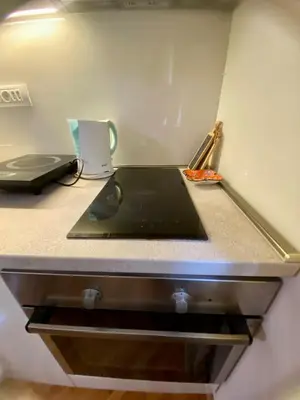 a kitchen counter with a laptop on top of it at City Center 1 in Podgorica