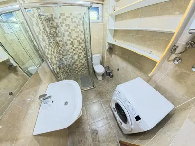 a bathroom with a shower and a sink and a toilet at Tivat Garden Apartments - Near Airport & Beach, Quiet Stay in Tivat