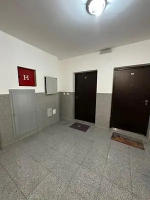 an empty room with three elevators in a building at Apartment ViSI 102 in Budva