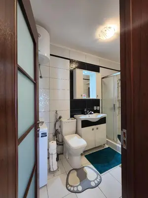 a bathroom with a toilet and a sink at Apartment Ulcinj in Ulcinj