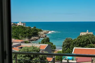 a view of the ocean from a balcony at Apartment SeaView in Utjeha