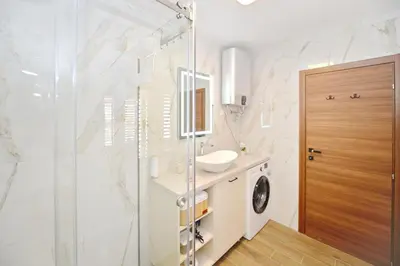 a bathroom with a shower and a sink at Antica Apartments in Kotor