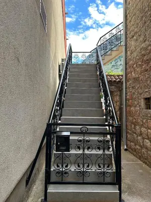 a stairway leading up to a building at Antica Apartments in Kotor