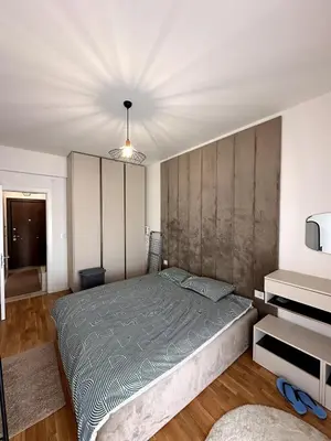 a bedroom with a large bed and a tv at Where Comfort Meets Convenience! in Stara Varoš