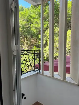an open door to a balcony with a view at Montenegro Seaside Lux Apartment in Petrovac na Moru