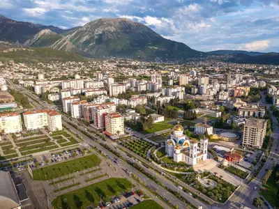 an aerial view of a city with a mountain in the background at Apartment BAR M3B in Bar