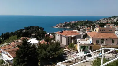 a view of a town and the ocean at Apartment Boksi in Ulcinj