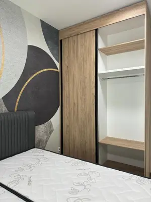 a bedroom with a bed and a sliding glass door at Ekaterina3VA in Becici