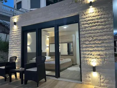 a room with a view of a bedroom at Rasi Sea Side Villa in Ulcinj