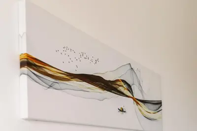 a painting of birds flying over a mountain at Big Family apartment - 3BR in Budva