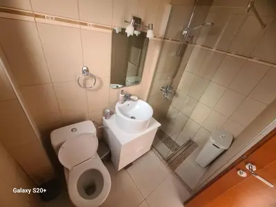 a bathroom with a toilet and a sink and a shower at Sunset studio Bečići in Becici