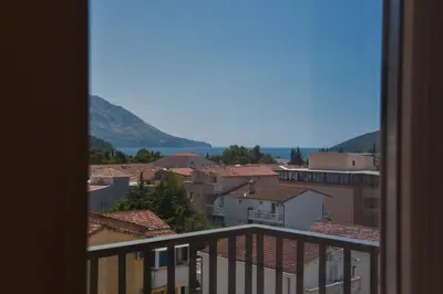 a view of a city from a balcony at Omega 1 Apartment Budva in Budva