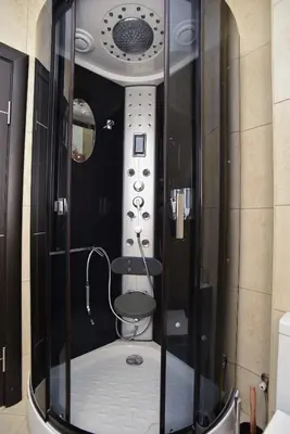 a bathroom with a shower with a toilet in it at Omega 2 Apartment Budva in Budva