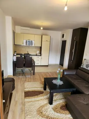 a living room with a couch and a table at Omega 2 Apartment Budva in Budva