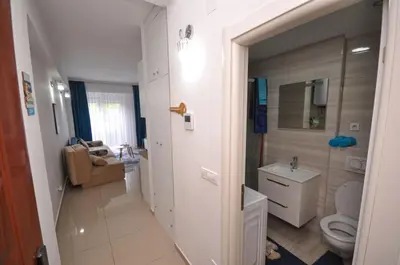 a bathroom with a toilet and a sink at DaSU 1 CENTAR in Bar