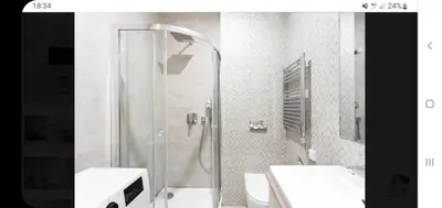 a bathroom with a shower and a sink at LucaSa Apartment in Kotor