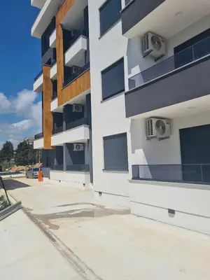 a white building with windows on the side of it at Morning star in Ulcinj