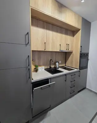 a kitchen with a sink and a stove at Morning star in Ulcinj