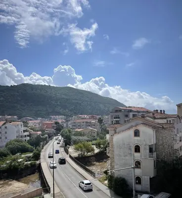 a view of a city with cars driving down a street at TehnomaX in Budva