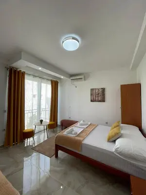 a bedroom with a large bed in a room at Elsa in Ulcinj