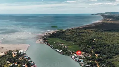 an aerial view of a beach and the ocean at River Breeze in Ulcinj