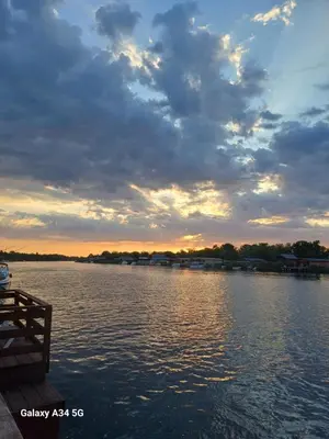 a view of a body of water at sunset at Mimas HOUSE ADA BOJANA in Ulcinj