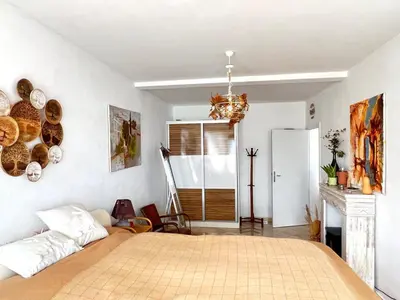 a bedroom with a large bed in a room at Hladna Uvala Apartment - 2 bedroom in Bar