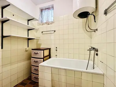 a bathroom with a bath tub in a room at Princess of the Beach in Sutomore