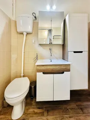 a bathroom with a toilet and a sink at Princess of the Beach in Sutomore