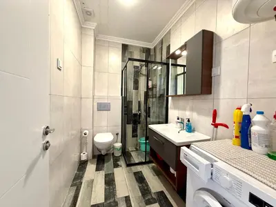 a bathroom with a shower and a toilet and a sink at Veliki Pijesak One Bedroom Apartment in Dobra Voda