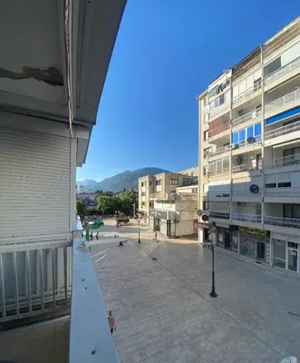 a view of a street in a city with buildings at Centar, Kosta apartment in Bar