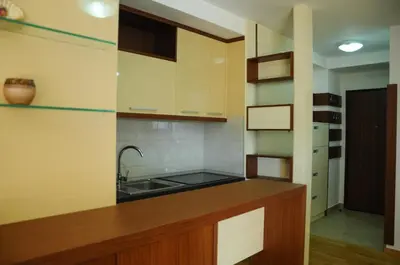 a kitchen with a sink and a counter top at Andreja Apartment in Budva