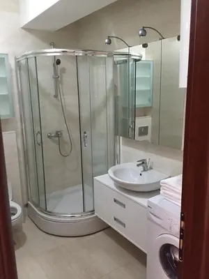 a bathroom with a shower and a sink at Andreja Apartment in Budva