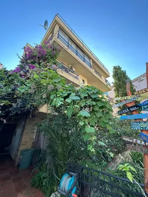 a building with plants on the side of it at Bono Apartments in Budva