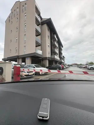 a remote control sitting on the dashboard of a car at Apartments Masa in Podgorica