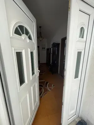 an open door in a room with a hallway at Cool room in Authentic Montenegro House in Ulcinj