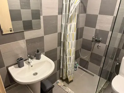 a bathroom with a sink and a shower at Studio apartament Vukcevic 2 in Golubovci