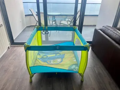 a trampoline in a living room with a table at Alice in Seoca