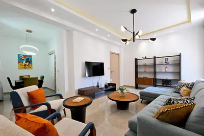 a living room with a couch and a tv at Old Town Lux in Kotor