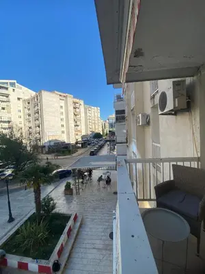 a view of a city street from a balcony at Kosta in Bar