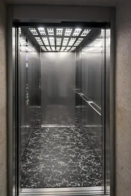 a elevator with a walkway in a building at Hotel Adler in Ulcinj