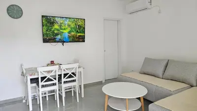 a living room with a couch and a table at ValMar in Bar, Susanj