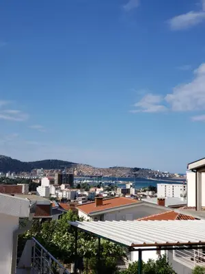 a view of the city from the roof of a building at Уютная 1-комнатная квартира с видом на море! in Bar