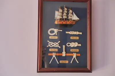 a picture of a clock with a pirate ship at Apartman Sveti Stefan in Sveti Stefan