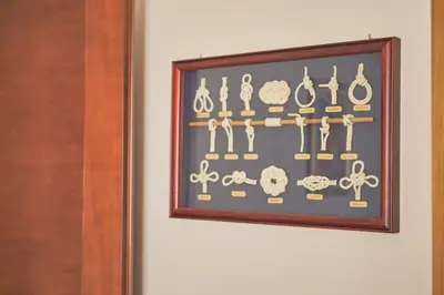 a framed picture of keys hanging on a wall at Apartman Sveti Stefan in Sveti Stefan