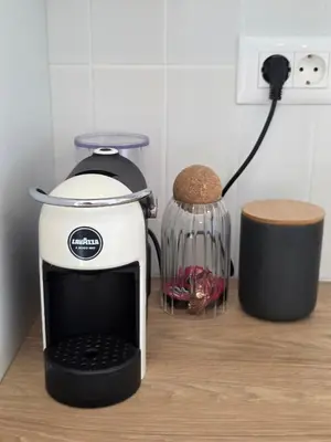 a toaster sitting on a counter next to a blender at Laurel apartment in Kravlja